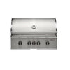 Front view of a built-in Coyote stainless steel grill with lid closed, four control knobs, a temperature gauge on the lid and Coyote badge, on a white background