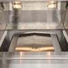 Stainless steel interior firebox and drip tray of Coyote outdoor grill