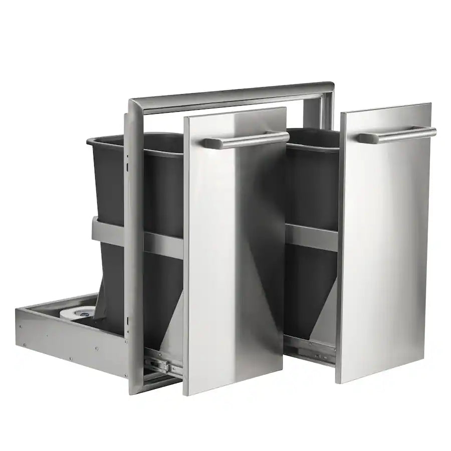 A stainless steel built-in outdoor double-door trash and recycle cabinet shown at an angle with the doors and pull-out drawer open, revealing two black liner bins on the sliding tray, against a white background