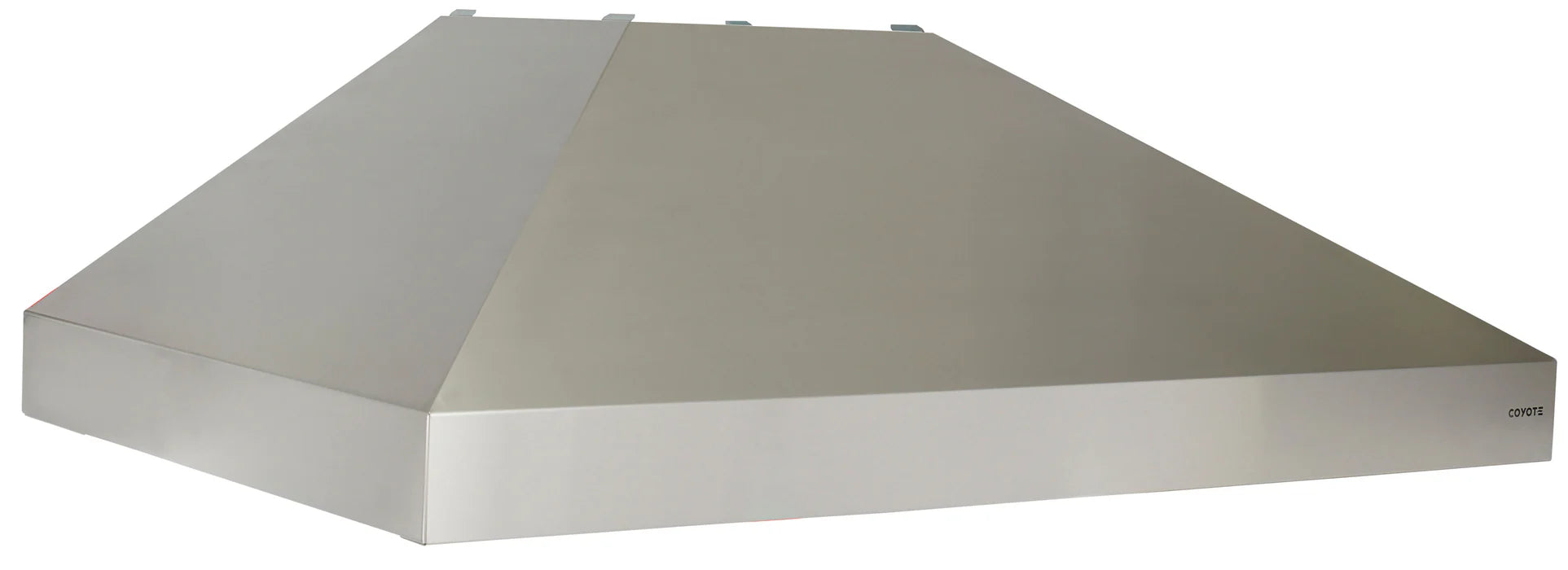 A wide stainless steel Coyote range hood with an angled chimney-style canopy and the Coyote logo on the lower front, shown from a three-quarter angle against a white background