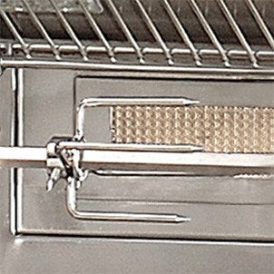 Close-up of the infrared rotisserie burner and spit rod inside an Alfresco built-in gas grill