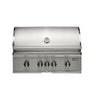 Front view of a built-in Coyote stainless steel grill with the lid closed, a round temperature gauge on the lid, five control knobs across the front and the Coyote badge, on a white background
