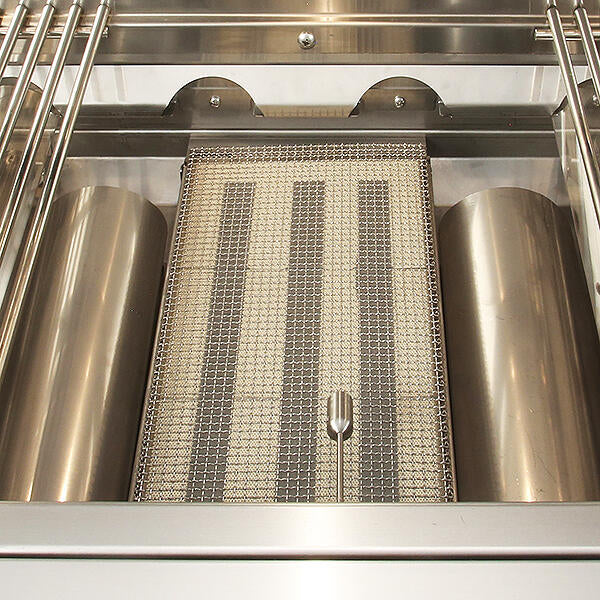 Alfresco infrared sear zone insert fitted between the tube burners of a 36-inch AIPG grill firebox, AIPG-SZK-36
