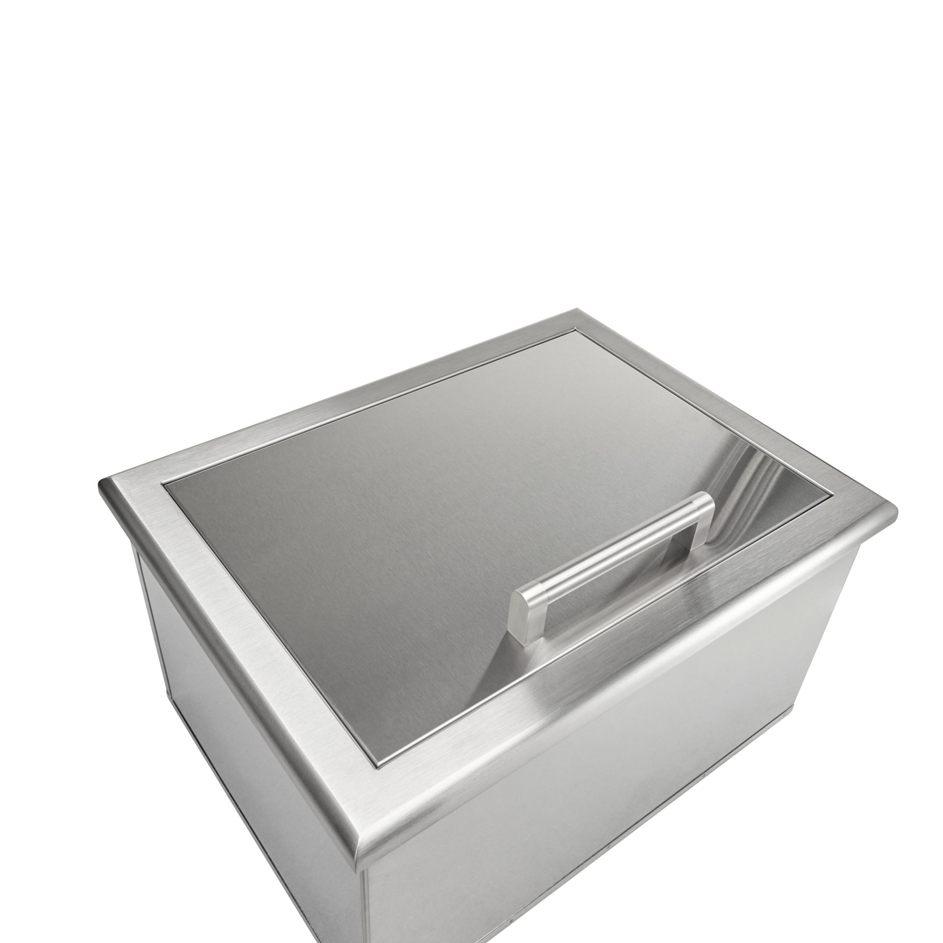 A stainless steel drop-in outdoor kitchen ice chest cooler shown at a three-quarter angle with its sliding lid closed and a tubular bar handle on the lid, against a white background