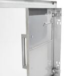 A stainless steel outdoor kitchen cabinet door shown open at an angle, revealing an interior-mounted paper towel holder on the inside of the door, against a white background