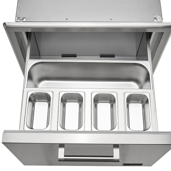 A Coyote 26-inch pull-out ice chest drawer shown open from above, revealing the deep stainless steel ice basin with four removable rectangular insert pans, against a white background