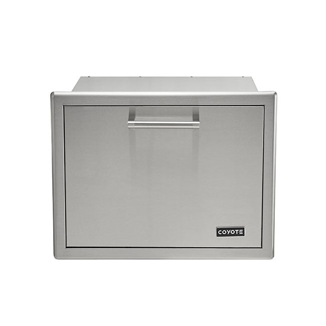 A stainless steel Coyote 26-inch pull-out ice chest drawer with a recessed bar handle and the Coyote logo on the lower-right front, shown front-on against a white background