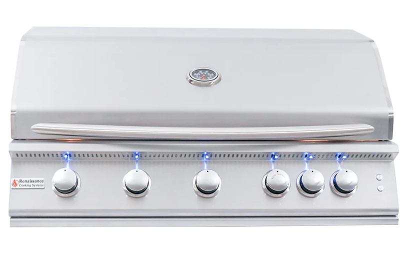 Front view of a built-in Renaissance Cooking Systems stainless steel grill with the lid closed, showing the temperature gauge, six control knobs with blue LED-lit rings and the RCS logo, on a white background