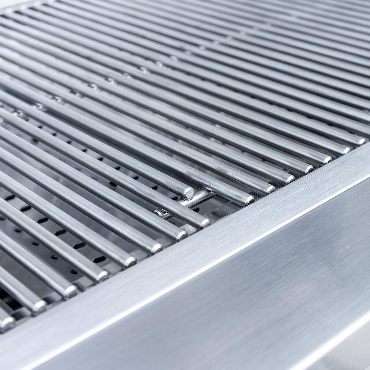 Close-up of the stainless steel cooking grates on a Summerset built-in gas grill