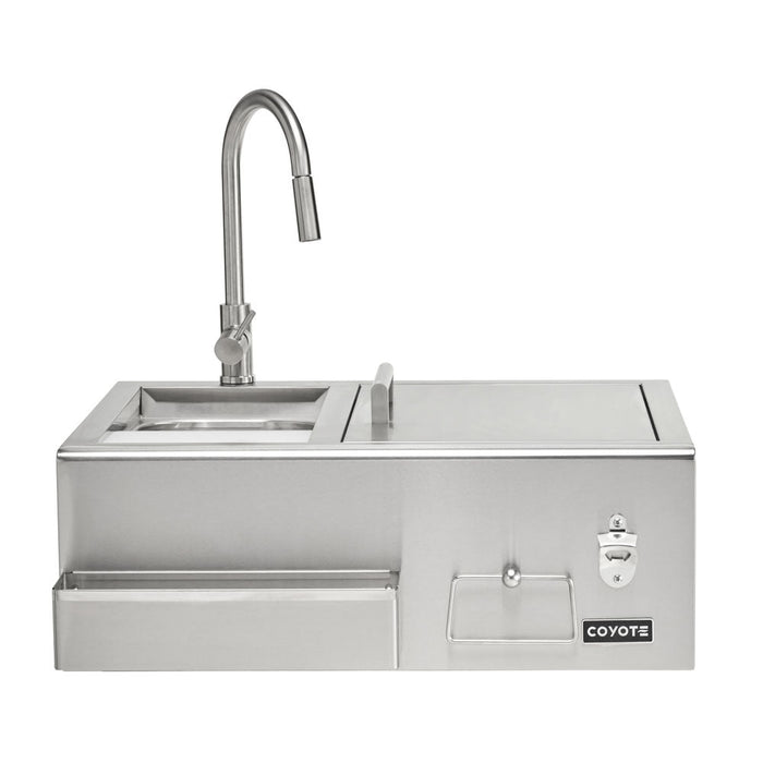 A stainless steel Coyote 30-inch refreshment center shown front-on, featuring a gooseneck faucet and sink on the upper left, a sliding-lid ice and prep area, a built-in bottle opener, a front condiment drawer, and the Coyote logo on the lower right, against a white background