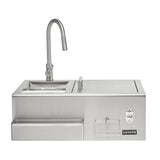 A stainless steel Coyote 30-inch refreshment center shown front-on, featuring a gooseneck faucet and sink on the upper left, a sliding-lid ice and prep area, a built-in bottle opener, a front condiment drawer, and the Coyote logo on the lower right, against a white background