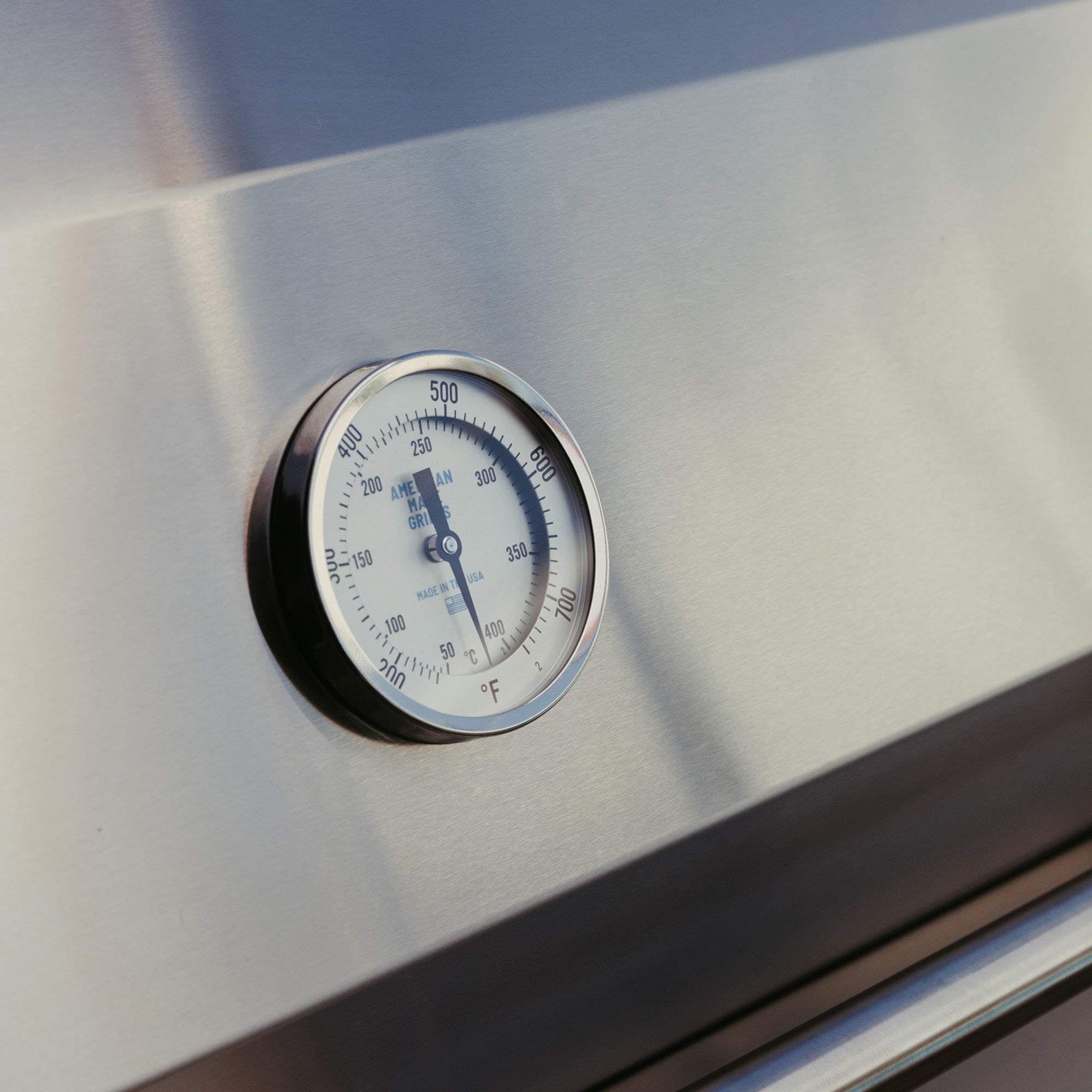 American Made Grills Encore 54-inch hybrid built-in grill — analog hood temperature gauge
