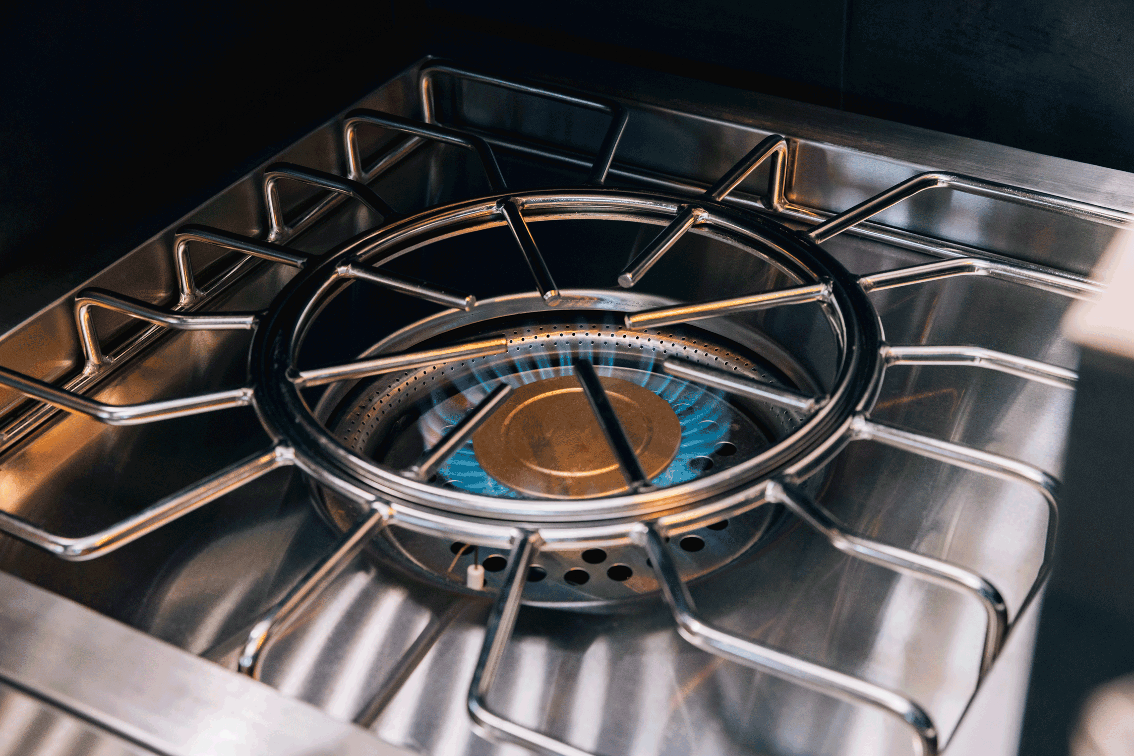 American Made Grills Encore power burner — dual-ring burner lit