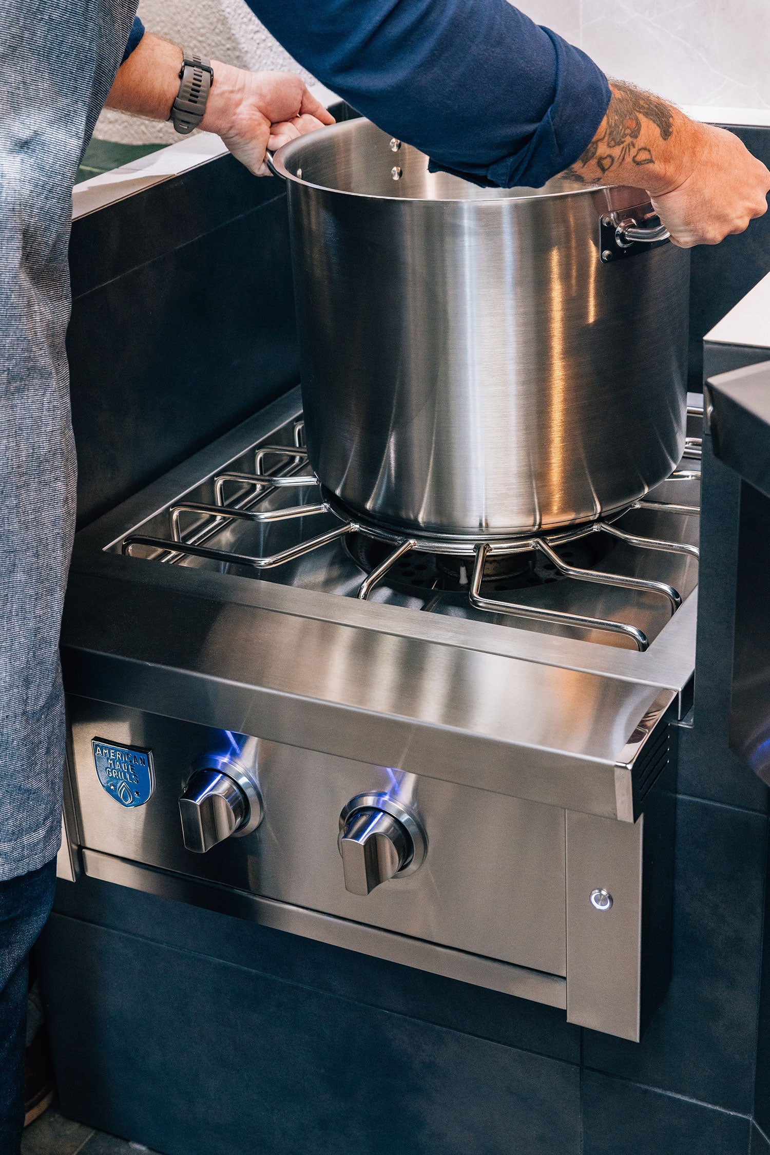 American Made Grills Estate power burner — shown in an outdoor kitchen setting