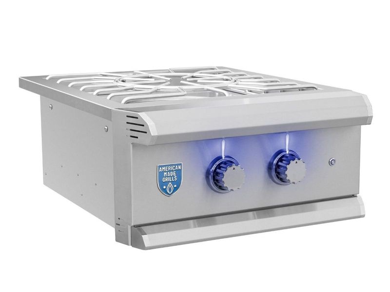 Close-up of the American Made Grills Muscle Grill Power Burner with stainless steel burners and spacious cooking surface.