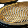 Stainless steel cooking grate seated in the ceramic firebox of the Primo Oval X-Large All-In-One ceramic charcoal grill, PGCXLC