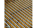Close-up of the stainless steel cooking grate on the Primo Oval XX-Large ceramic charcoal grill head, PGCXXLH