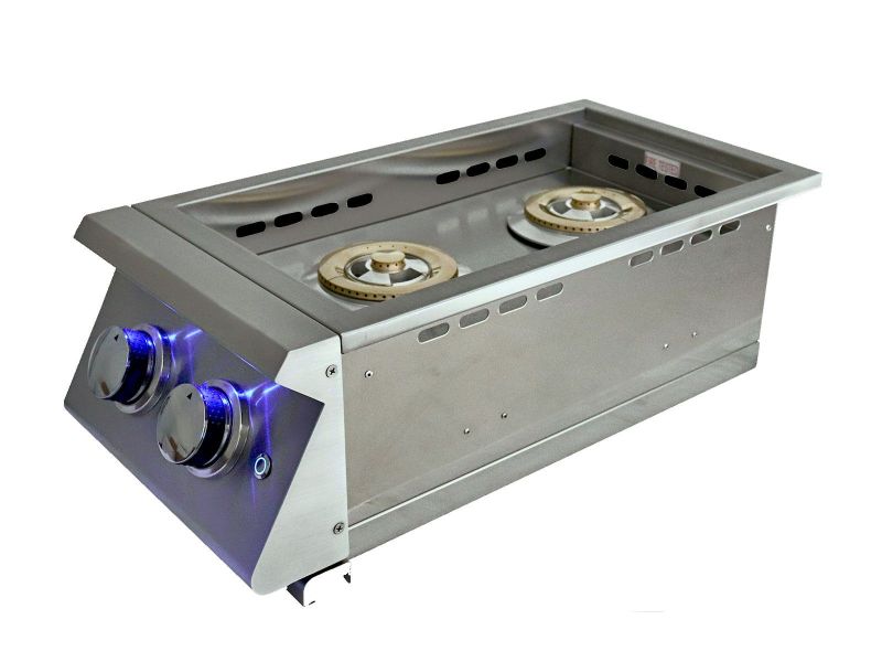 Close-up view of RCS Premier "L" Series Double Side Burner RJCSSBL's blue LED control knobs, enhancing nighttime visibility for grilling.
