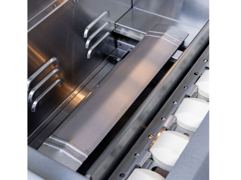 Close-up of a Summerset Sizzler Pro grill interior showing the stainless steel heat tents and ceramic briquette trays
