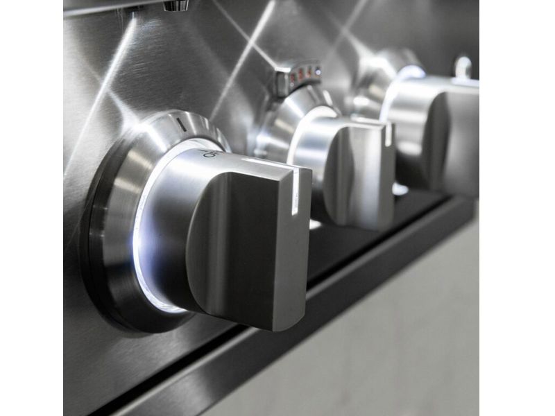 Close-up of stainless steel control knobs on a Summerset Sizzler Pro built-in gas grill