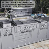 Inside view of Sunstone Ruby 42" 5 Burner Built-In Grill featuring spacious cooking grids and halogen lighting for evening grilling.