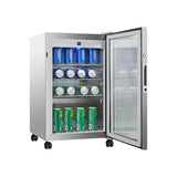 Equator Advanced Appliances OR230 Outdoor Refrigerator in action on a backyard patio, perfect for outdoor gatherings.