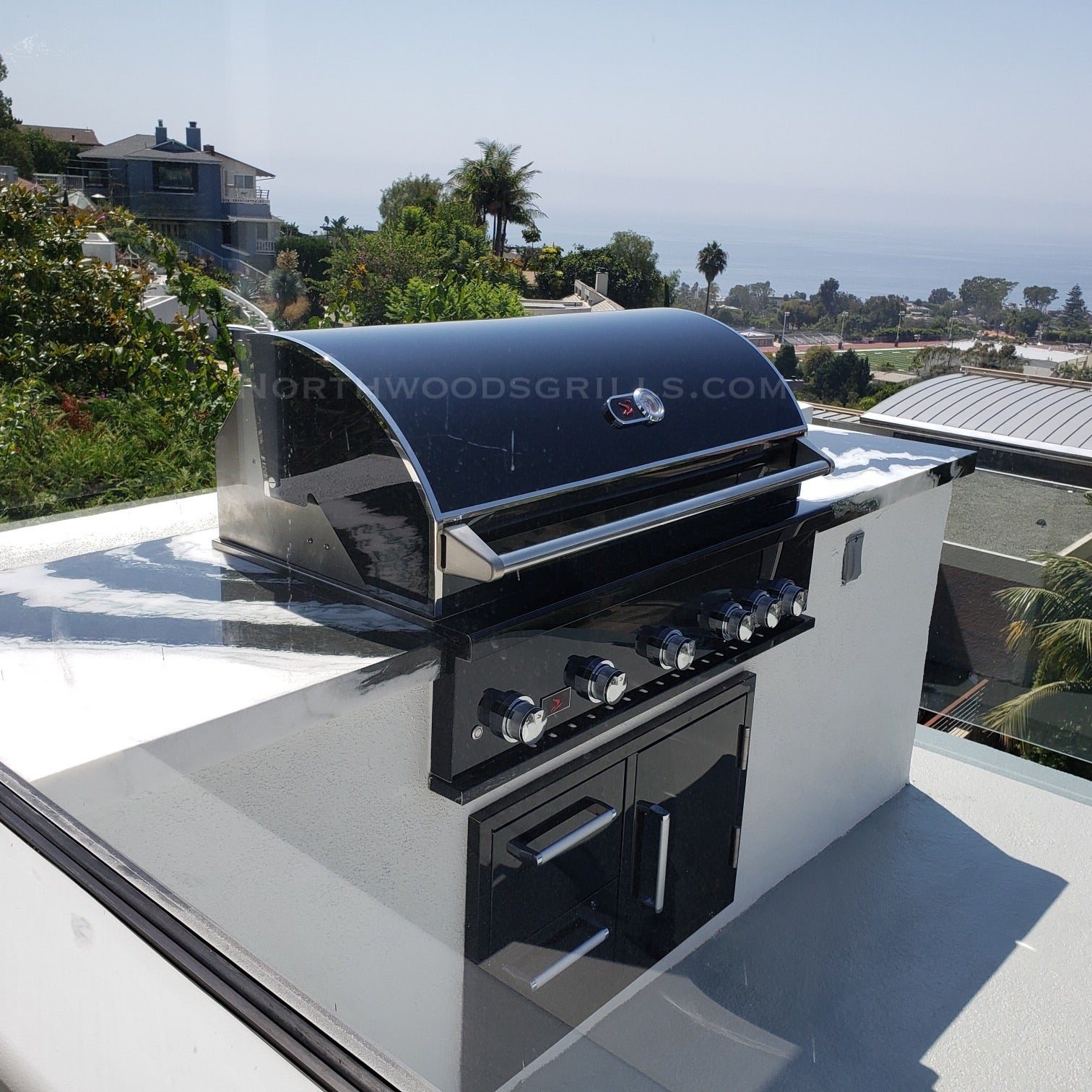 Bonfire Black Door & Drawer Combo 22" x 33" installed in an outdoor kitchen, perfect under the Bonfire Prime 500 grill.