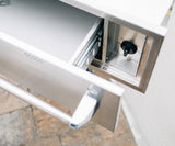 Summerset 36" Stainless Steel Warming Drawer installed in an outdoor kitchen setting, ideal for keeping food warm.