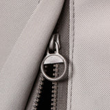 Zipper closure detail on gray Coyote grill cover fabric