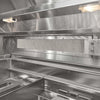 Interior view of a stainless steel grill showing the rear infrared burner mesh panel, interior light, and warming rack