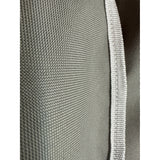 Weatherproof gray fabric with white trim on Coyote grill cover, close-up