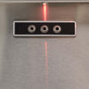 Close-up of Coyote grill ignition and light control buttons with LED indicator