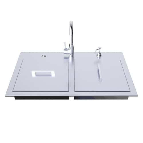 Stainless steel drop-in outdoor kitchen sink with faucet, soap dispenser, and hinged cover on white background