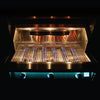 Front view of a built-in stainless steel grill with the lid open, showing the glowing lit interior, cooking grates, warming rack and a row of teal-blue backlit control knobs with a digital temperature display, on a black background