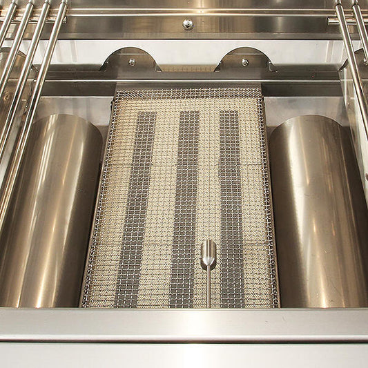 Alfresco infrared sear zone insert fitted between the tube burners of a 36-inch AIPG grill firebox, AIPG-SZK-36