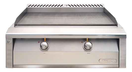 Alfresco 30-inch dual-zone gas griddle head (AXE-30GT built-in, AXE-30GTC cart), front view showing the solid steel griddle plate, rear exhaust vent and two illuminated control knobs