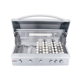 Close-up of RCS 40" Premier Drop-In Grill control knobs and Sure-Strike ignition system for easy grilling adjustments.
