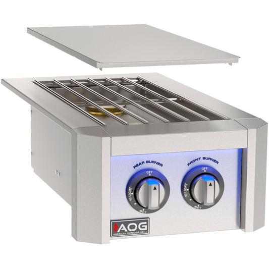 American Outdoor Grill (AOG) stainless steel built-in double side burner with blue LED control knobs and removable lid on a white background