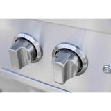 Close-up of two stainless steel AMG Atlas double side burner control knobs set to OFF