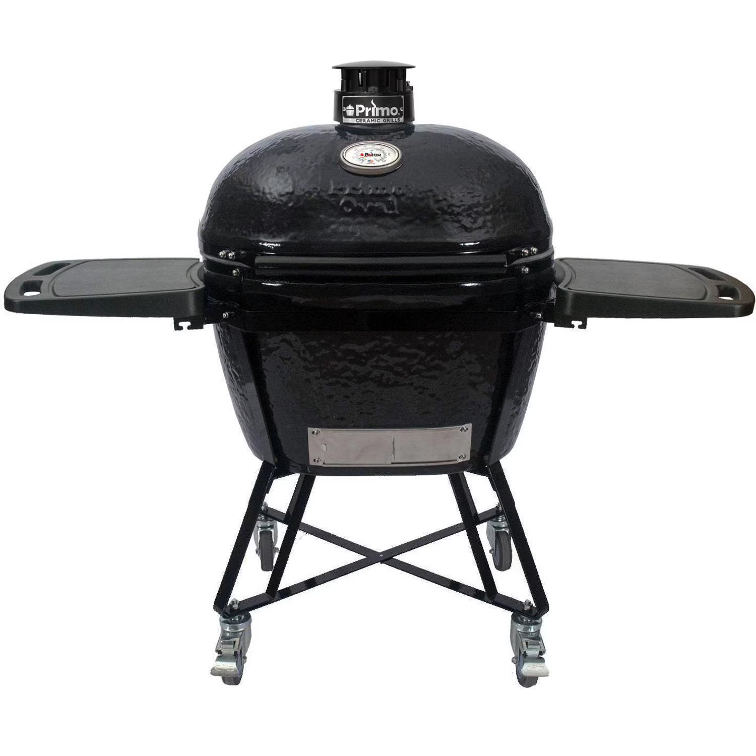Primo Oval X-Large All-In-One ceramic charcoal grill on its heavy-duty stand with side shelves, PGCXLC