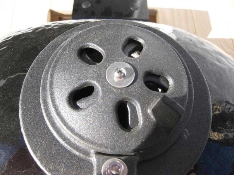Top vent damper on the Primo Round ceramic charcoal grill head, PGCRH