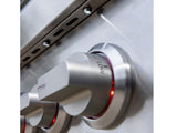 Close-up of an illuminated control knob set to low with red LED ring on a Summerset Sizzler Pro built-in gas grill