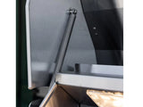 Close-up of the lid hinge spring and interior light on a Summerset TRL Pro built-in gas grill