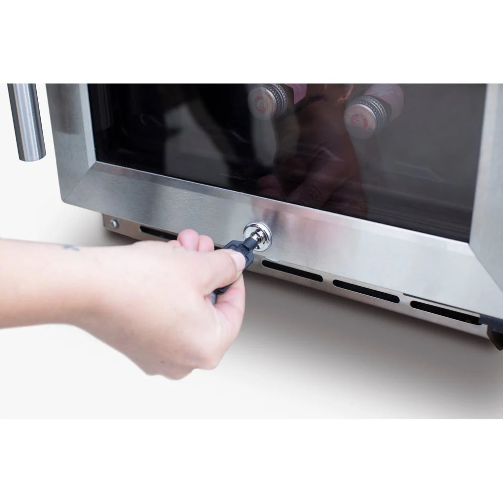 Hand opening the glass door of a TrueFlame 15-inch outdoor wine cooler