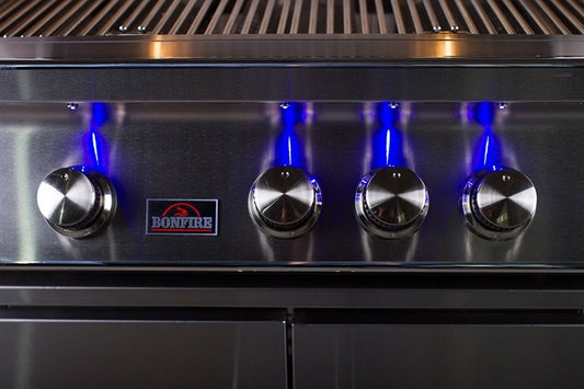 Close-up view of the Bonfire Whistler 3 Built-in Grill 28" with rotisserie kit included, highlighting high-quality construction and performance features.