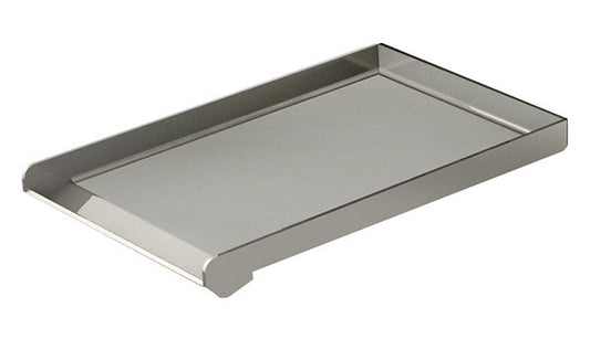 Artisan Drop In Griddle sitting on an Artisan grill, showcasing its design and versatility for cooking.